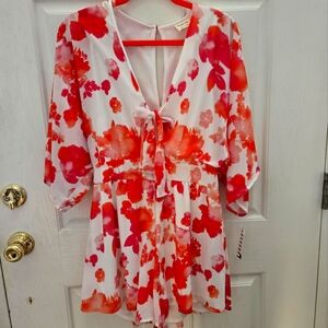 Floral Jumper. Brand: Peach Love, size L